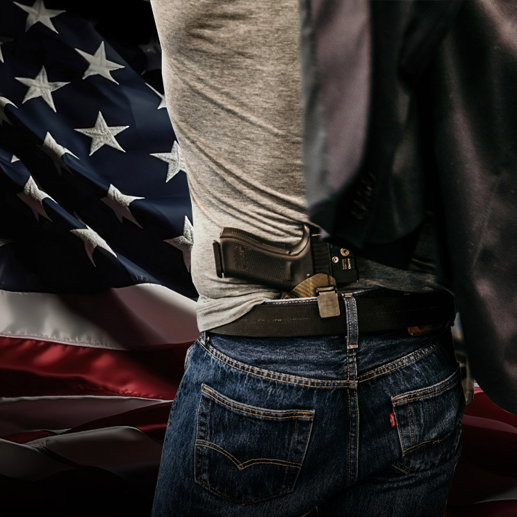 Man and an american flag with a concealed pistol